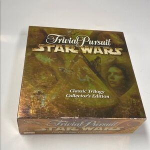 Star Wars Trivial Pursuit 1997 opened box but pieces still packaged not played.